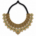 Antique gold-tone statement necklace with circular sunburst medallions and green stone accents on a black cord - only 1 available
