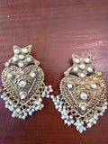 Antique gold tone chandelier earrings with white pearl-style bead details