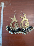 Antique gold tone bird drop earrings with black beads and pearl-style accents